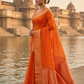Orange Maheshwari Silk Saree - Side View at Kashi Ghats